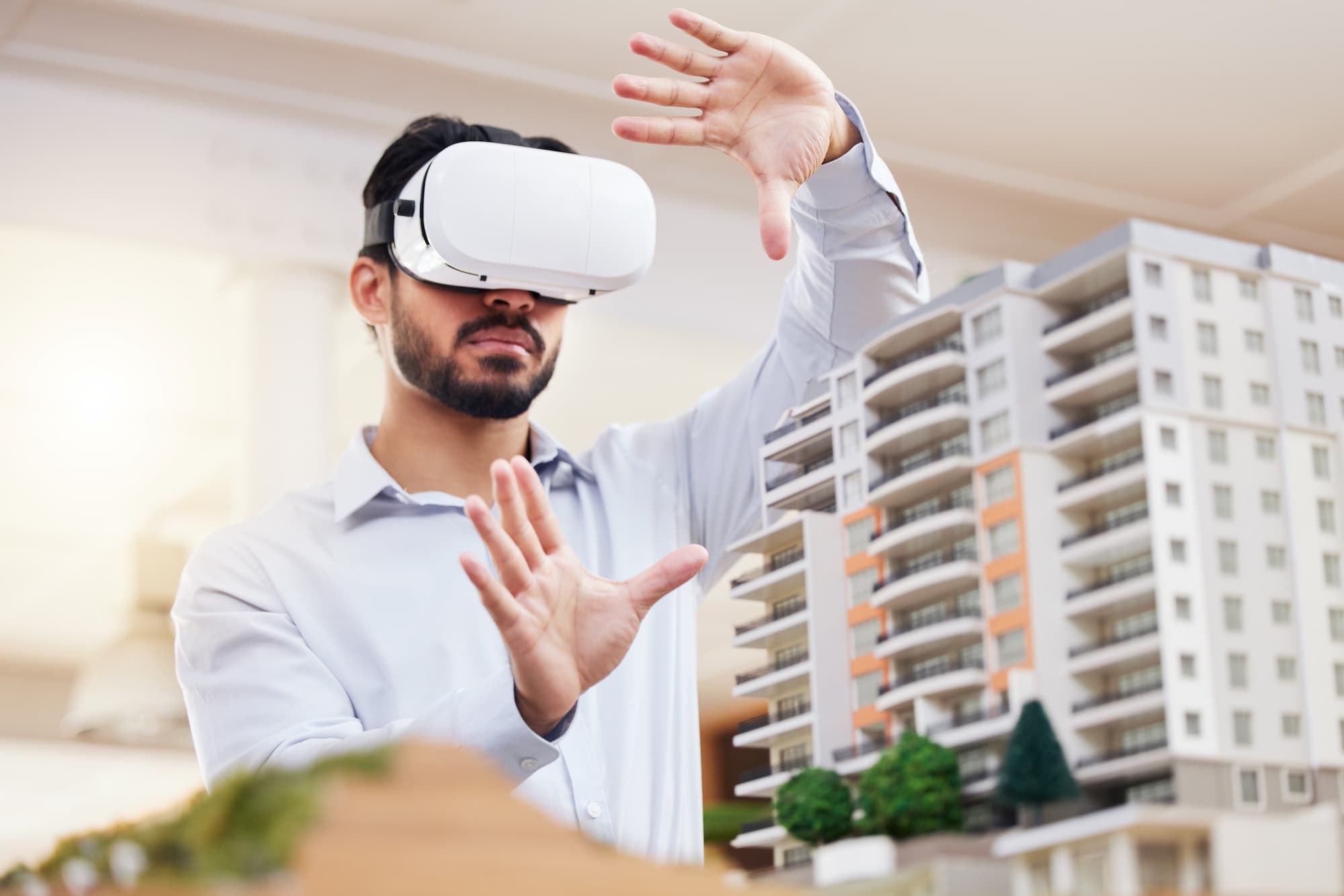 Architect using VR to visualize architecture model